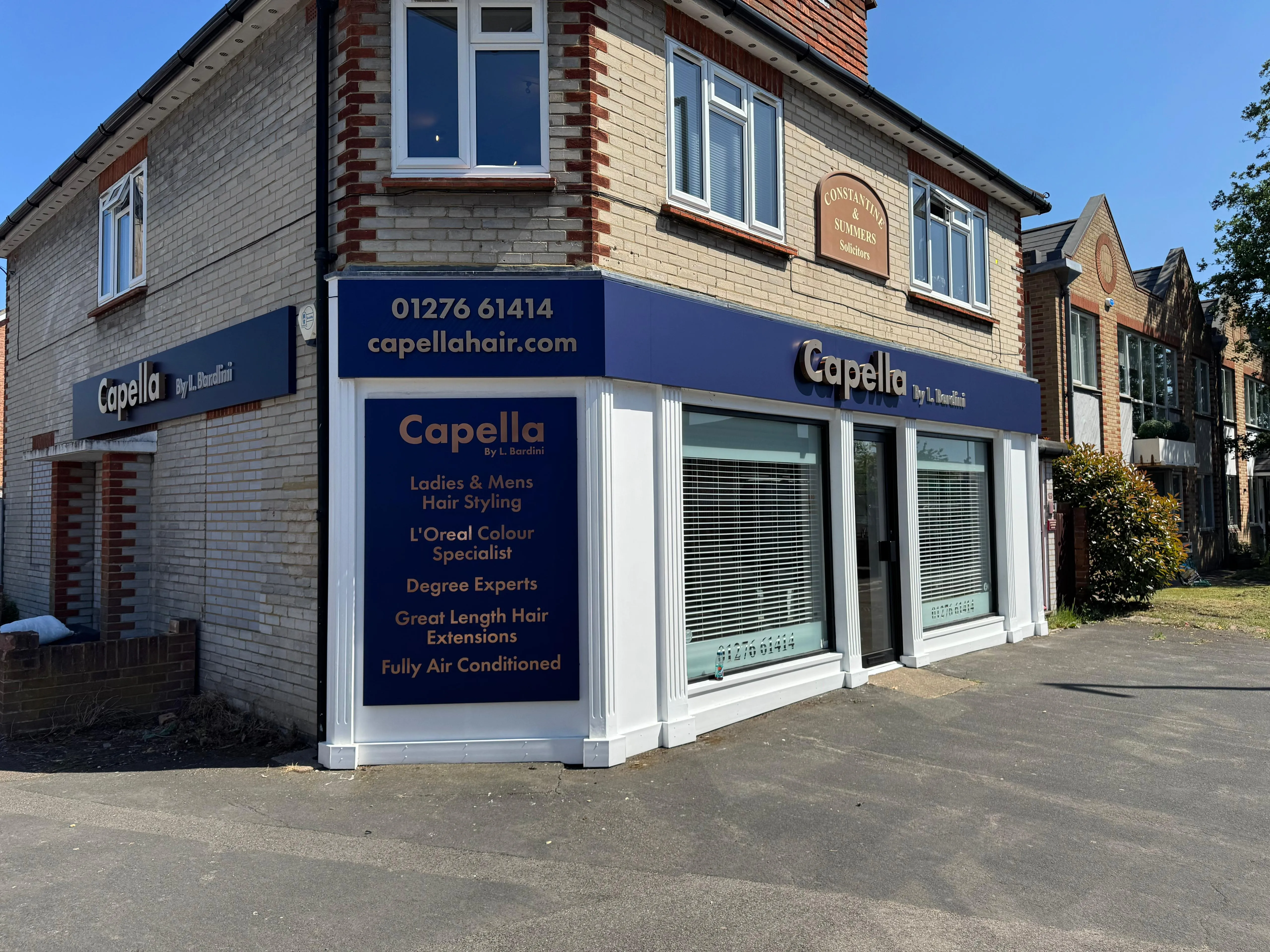 A building with a sign on the front of it.