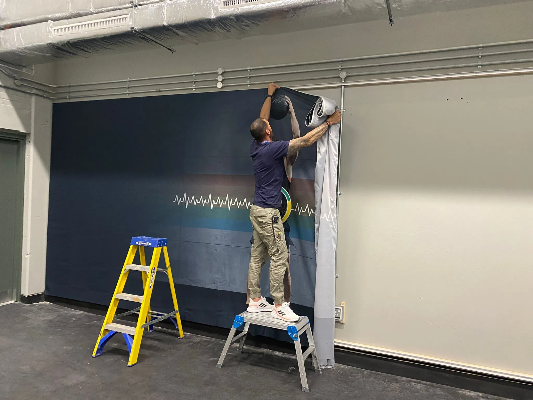 lsbu putting up wall decal